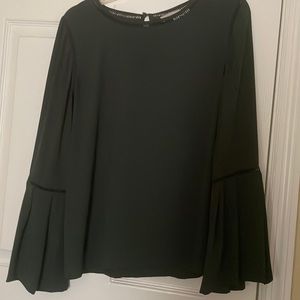 Women’s long sleeved emerald green blouse with flowy sleeves. Only worn once.